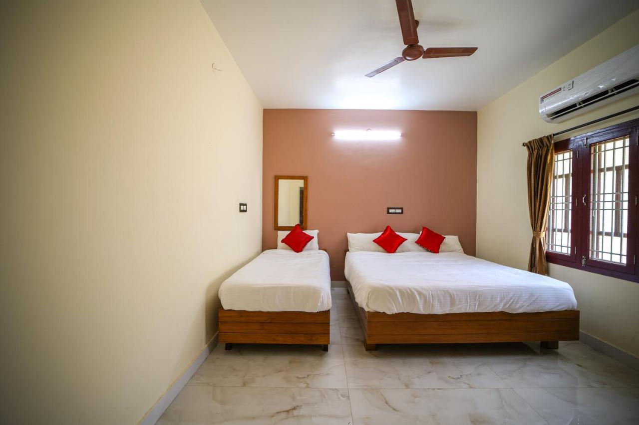 The Pothigai Palace Otel Kuttālam Dış mekan fotoğraf